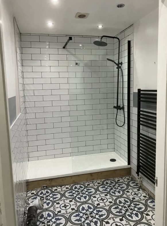 Large walk-in shower tray fitted where a bath was removed